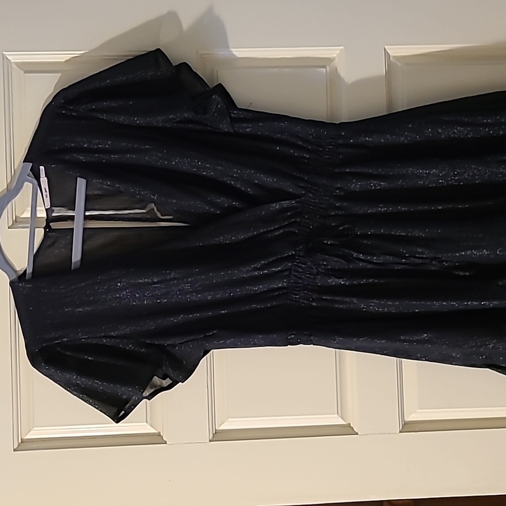 Miami dress black Size Large . Shimmery fabric and flowing sleeves and skirt.